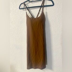 Brown Athletic dress with built in shorts pockets and Adjustable Straps size M